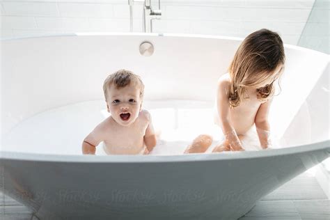 Brother And Sister Sitting In A Bathtub By Stocksy Contributor Jakob Lagerstedt Stocksy