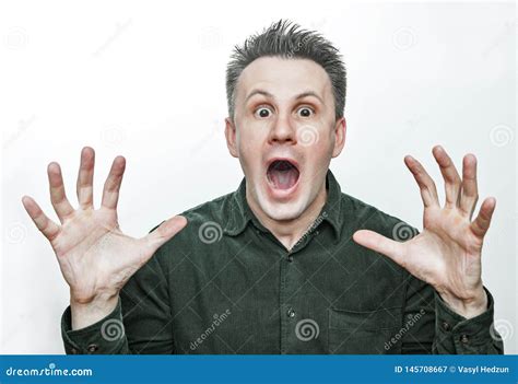 Man With Shocked Amazed Expression Isolated On White Background Stock