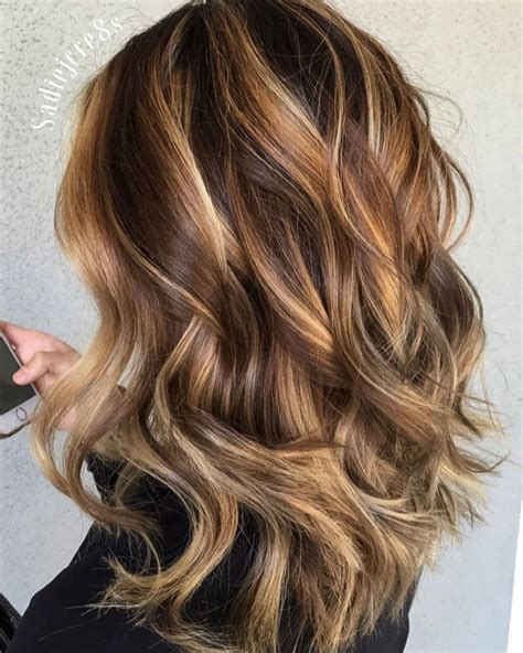 Brown Hair With Highlights And Lowlights Brown Hair Balayage Brown Blonde Hair Hair Color