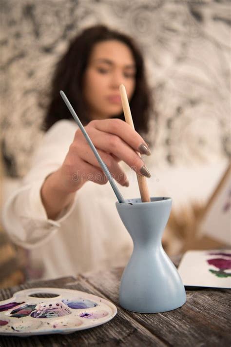 Closeup Of Beatifull Female Artist Hand Holding Paintbrush Stock Image