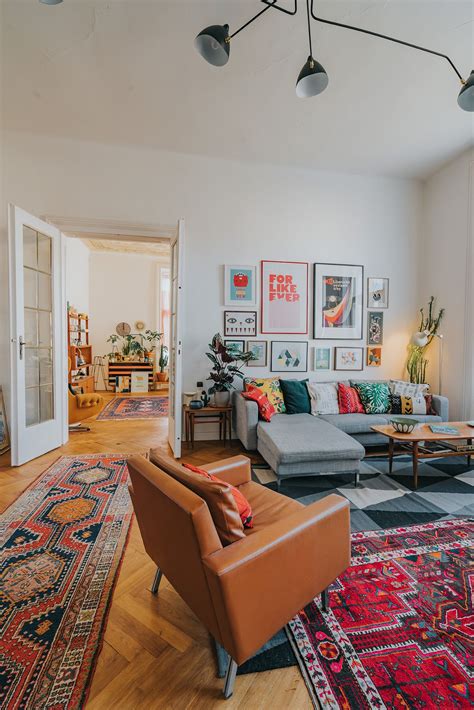 Mid Century Boho Living Room With Oriental Rugs And Large