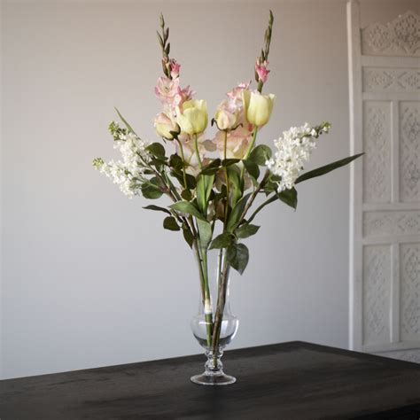 Double peonies are of those peonies which have multiple rows of petals emerging from the crown of the flower with the crown of the flower covered by petals. Peony Seasonal Faux Flowers Bouquet - QVC UK