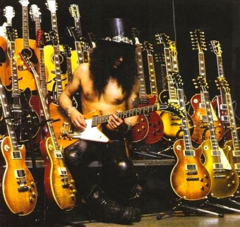 Slash And His Guitar Collection Guns N Roses Velvet Revolver Rock Guitarist Guitar Collection