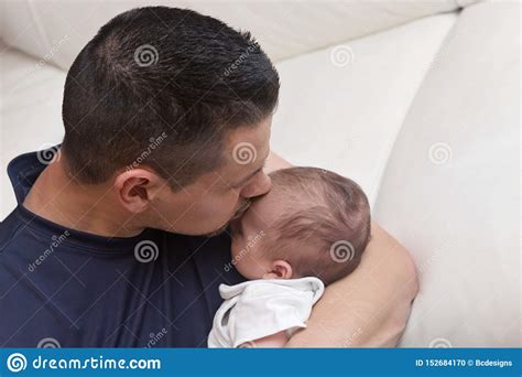 Father Lovingly Holding His Newborn Baby Tight Stock Photo Image Of