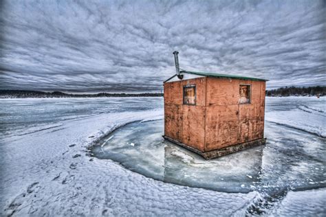 Ice Fishing On A Frozen Lake In Portland Maine