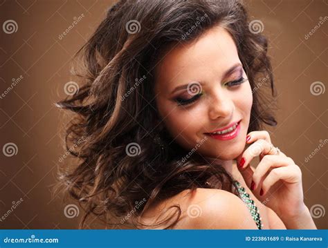 Brunette Girl With Long Healthy And Shiny Curly Hair Beautiful Model Woman With Wavy