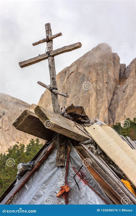 Wooden Christian Cross On Roof Of Tourist Hut As Symbol Of Protection