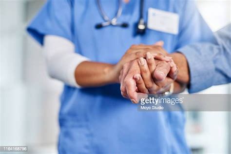 Nurse Hand On Back Photos And Premium High Res Pictures Getty Images