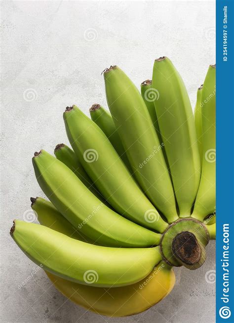 Comb Of Fresh Ripening Banana On A White Surface Stock Image Image Of