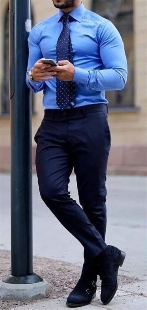 Light Blue Shirt Apired With Dark Blue Trousers And Tie You Can