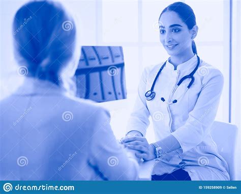 Healthcare And Medical Concept Doctor With Patient In Hospital Stock