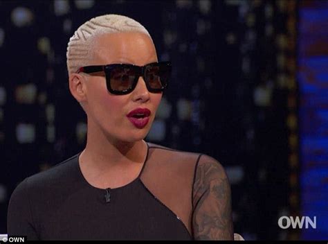 Amber Rose Showcases Her Curves In Skintight Mini Dress During Shopping