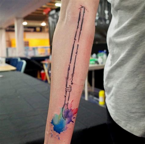 A great tattoo design that is beautiful because of the colors. Paint Brush & Watercolor Splashes | Best tattoo design ideas