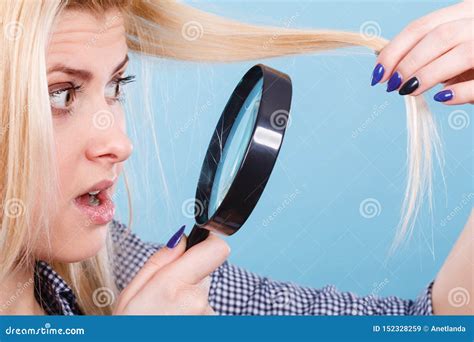 Woman Looking At Hair Through Magnifying Glass Stock Image Image Of