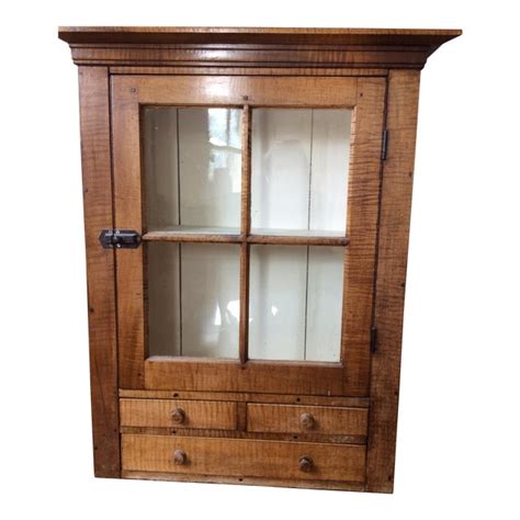 Maybe you would like to learn more about one of these? "Tiger Maple" Wood Cabinet | Chairish