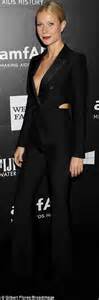 Gwyneth Paltrow shows daring décolletage in VERY low cut pantsuit at