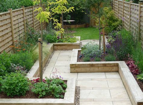 Garden benches are ideal for gardens large or small. Pin by A M on Susans seaside garden | Garden layout, Small ...