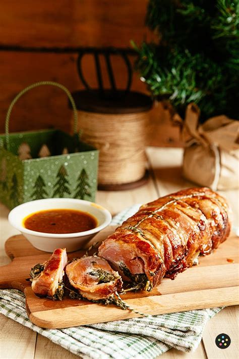 Bring the long edges together first and fold them over a few. Bacon-Wrapped Pork Loin Stuffed with Spinach and Goat ...