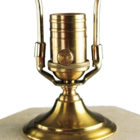 Full assortment of exclusive products found only at our official site. Pair of Wildwood Tessellated Stone Table Lamps with Brass Trim For Sale at 1stdibs