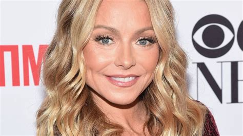 Kelly Ripa Showcases Toned Physique In Stylish Swimsuit While Taking A