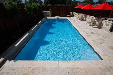 Rectangle Pool Set In A Small Backyard Featuring Npt Plasterscapes Sky