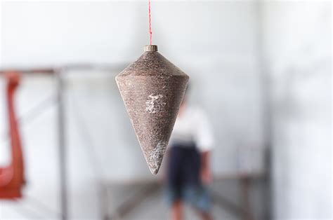 A Complete History Of The Plumb Bob And How To Use It