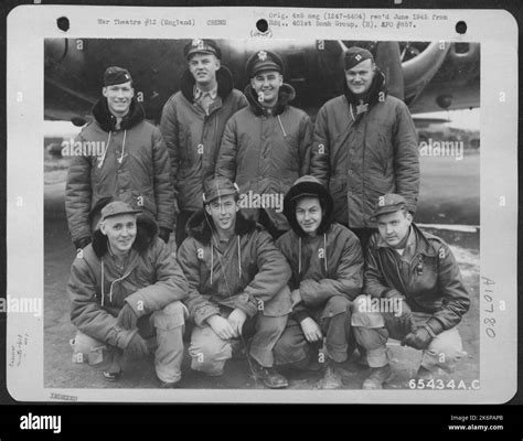Crew 22 Of The 613th Bomb Squadron 401st Bomb Group Beside The Boeing