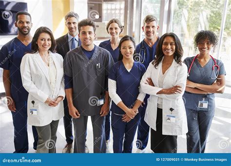 Team Of Healthcare Workers At A Hospital Smiling To Camera Stock Image