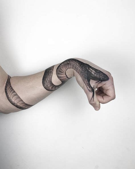 70 snake tattoos for men youtube 06 01 2020 snake tattoos wrapped around arm snake ankle tattoo 4 many snake species are popular than others for example rattlesnakes are known for their distinct source : Snake Tattoos | Around arm tattoo, Snake tattoo, Cobra tattoo