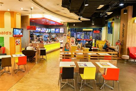 Mcdonald's corporation is an american fast food company, founded in 1940 as a restaurant operated by richard and maurice mcdonald, in san bernardino, california, united states. Inside of McDonald's restaurant - Stock Editorial Photo ...