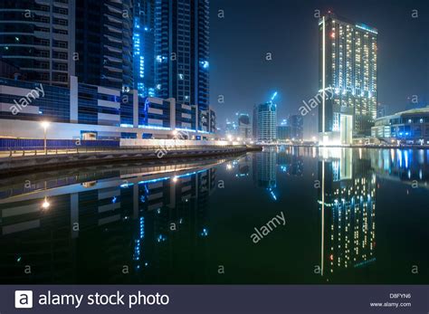 Skyscrapers In Dubai Marina At Night With Reflections New Dubai Uae