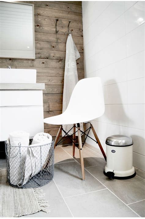 Consider contemporary bathroom decorating ideas when planning a makeover for a spacious bath. How to decorate a small bathroom with a white chair?