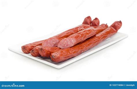 Smoked Vienna Sausages On White Rectangular Dish Closeup Stock Photo