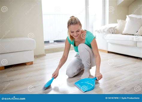 Happy Woman With Brush And Dustpan Sweeping Floor Stock Photo Image