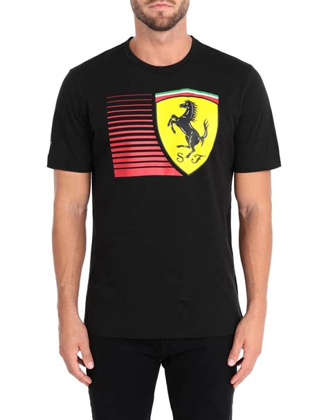 Maybe you would like to learn more about one of these? Ferrari Men's short-sleeve Puma T-shirt with yellow Shield Man | Scuderia Ferrari Official Store