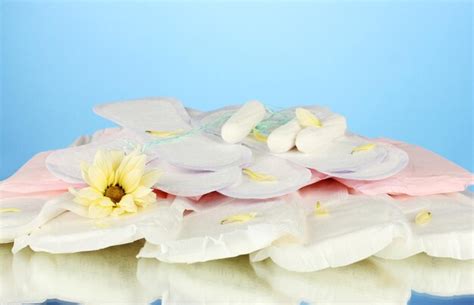 Premium Photo Various Types Of Sanitary Pads And Tampons On Blue