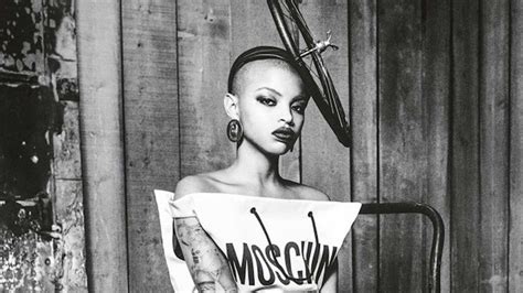Slick Woods Makes A Shopping Bag Chic In Moschinos Newest Campaign