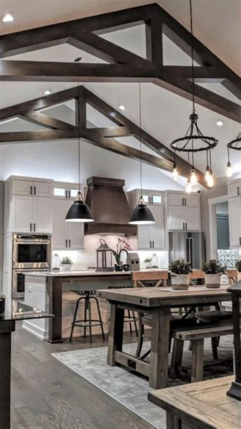 Modern Farmhouse Kitchen And Dining Room With Wooden Beams