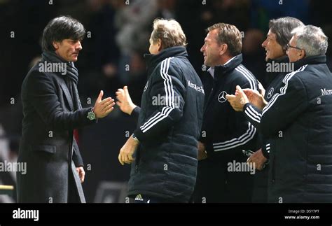 germany s coach joachim loew l celebrates with goalkeeper coach andreas koepke 3 l during