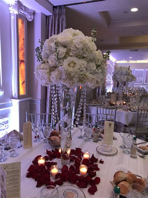 Wedding Centerpiece Of White Hydrangea White Roses White Carnations