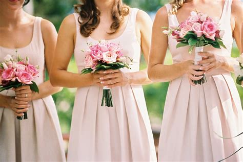 bridesmaids wearing matching dresses 10 wedding traditions you can skip