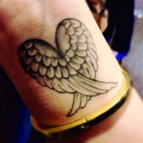 Angel Heart Tattoo 1000 Ideas About Heart Wings Tattoo On Pinterest