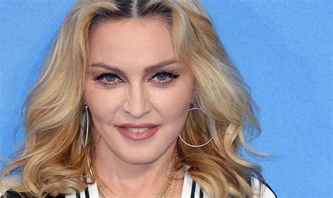 Madonna Goes Topless For Daring Bedroom Photoshoot