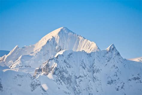Beautiful Snow Capped Mountains Stock Photo Image Of Blue Cliff