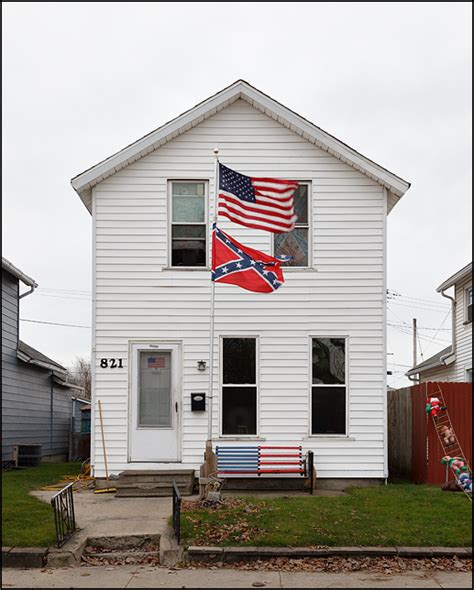 House With Confederate Flag And American Flag In Fort Wayne