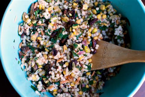 Spread the mixture evenly on a baking sheet until completely cooled, about 10 minutes. israeli couscous with fruit, nuts, and herbs — double thyme
