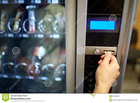 Hand Inserting Euro Coin To Vending Machine Slot Stock Photo Image Of