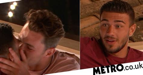 love island s tommy fury and curtis pritchard share a kiss on terrace metro news