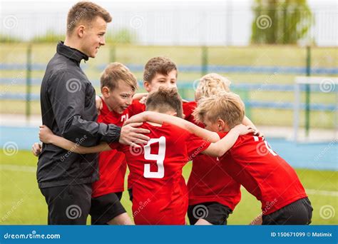 Coaching Youth Sports Kids Soccer Football Team Huddle With Coach