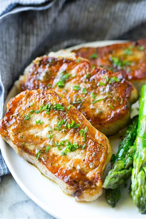 These baked pork chops are the best juicy, tender and flavorful oven baked pork chops! The easiest grilled ranch pork chops. | Grilled chicken recipes, Boneless pork chop recipes ...